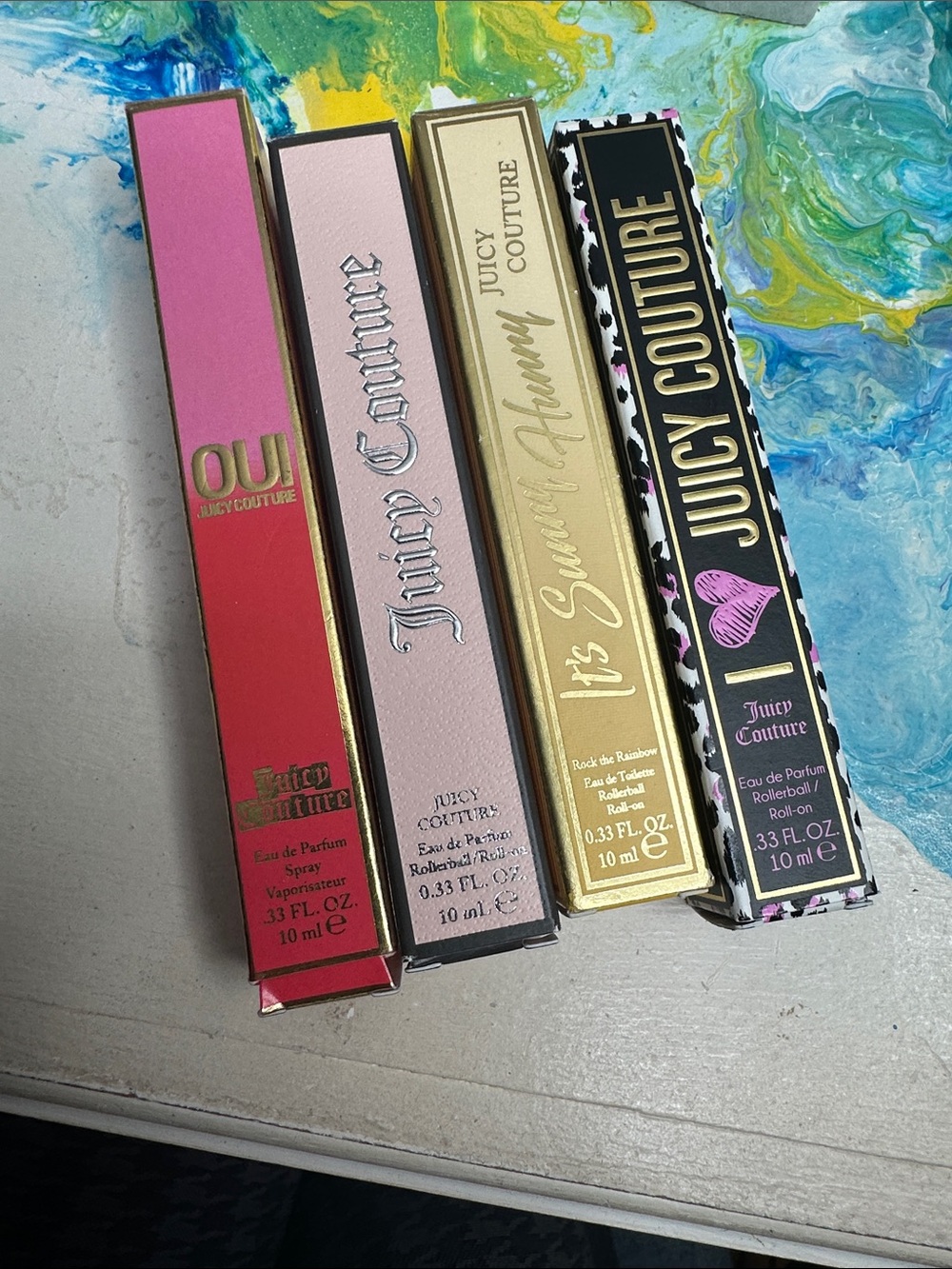 Juicy Couture Assorted Rollerball Fragrance Set all new in box
